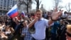 Russian opposition leader Aleksei Navalny addresses supporters during an unauthorized anti-Putin rally in May 2018. 